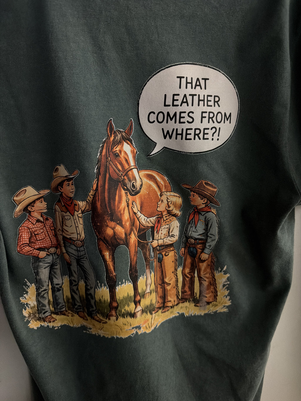 That Leather Comes From Where cowboy tee