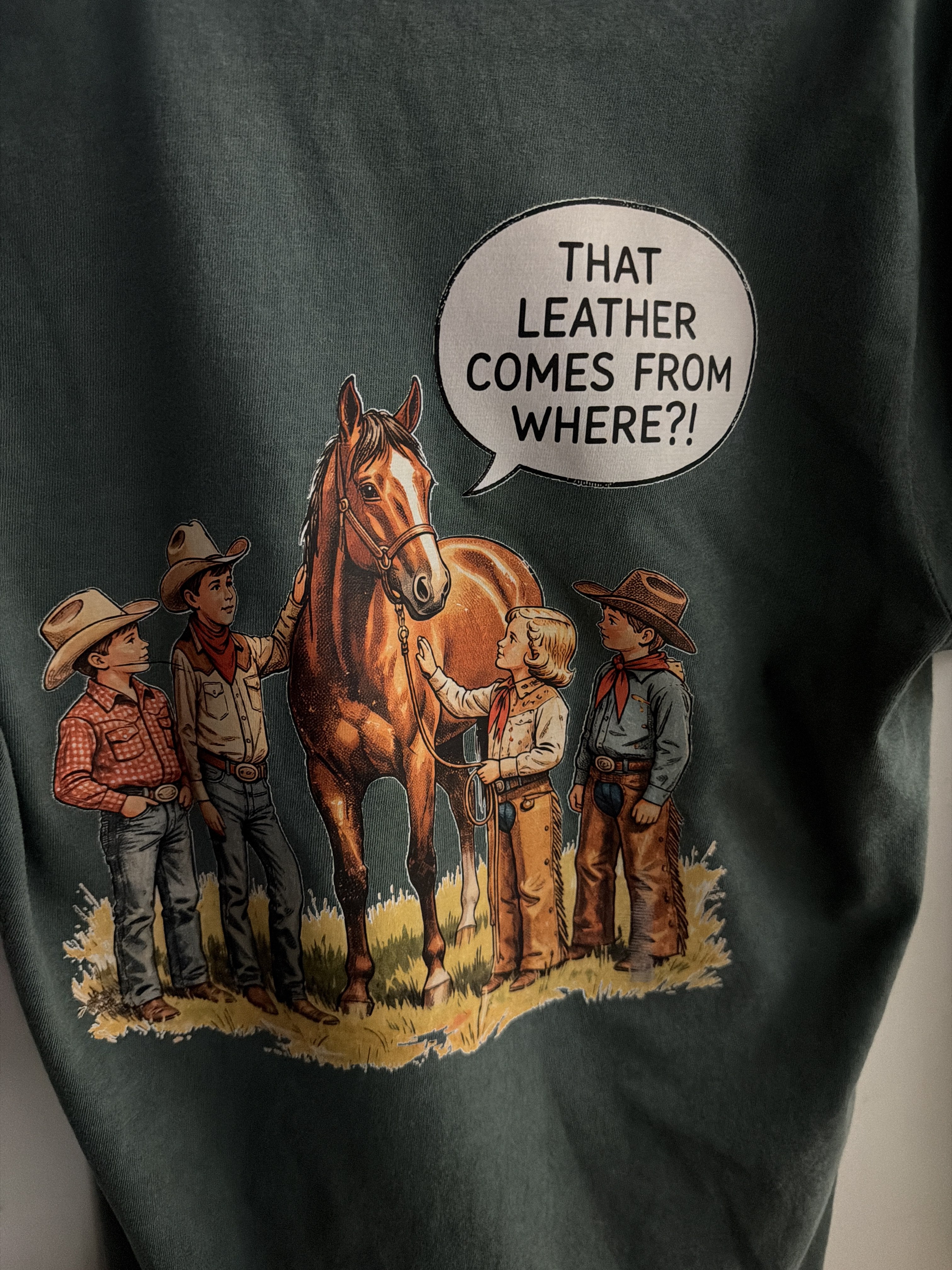 That Leather Comes From Where cowboy tee